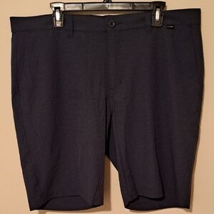 NWOT.  Travis Mathew Dark Blue Flat Front Performance Shorts.  Size 38.